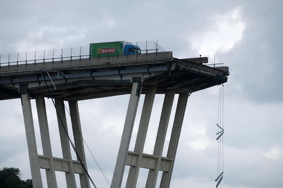 More than 20 people killed after highway bridge collapses in northern Italy
