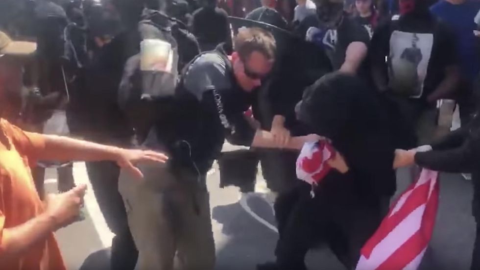 Antifa assault liberal Bernie Sanders supporter who dared to carry 'fascist' US flag at protest