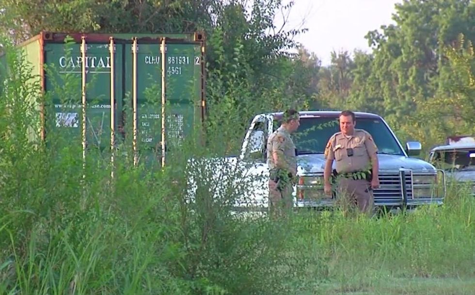 He spots men breaking into his storage unit with blowtorch. So he pulls out his gun.