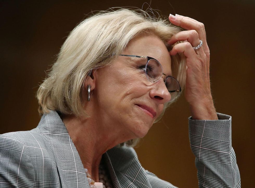 Arms dealer for schools': Groups threaten DeVos with lawsuit over alleged plan to arm teachers