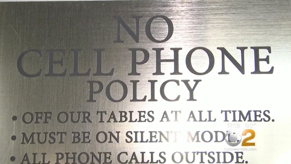 Frustrated restaurant owners asking diners to put away their phones; others ban use altogether