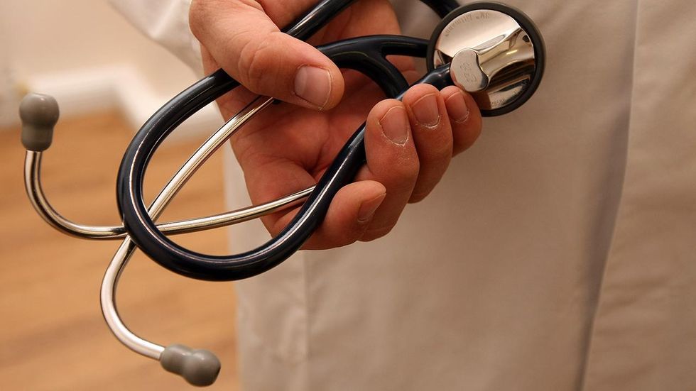 Georgia doctor convicted of fraud, fined for botched abortion that killed a woman gets license back