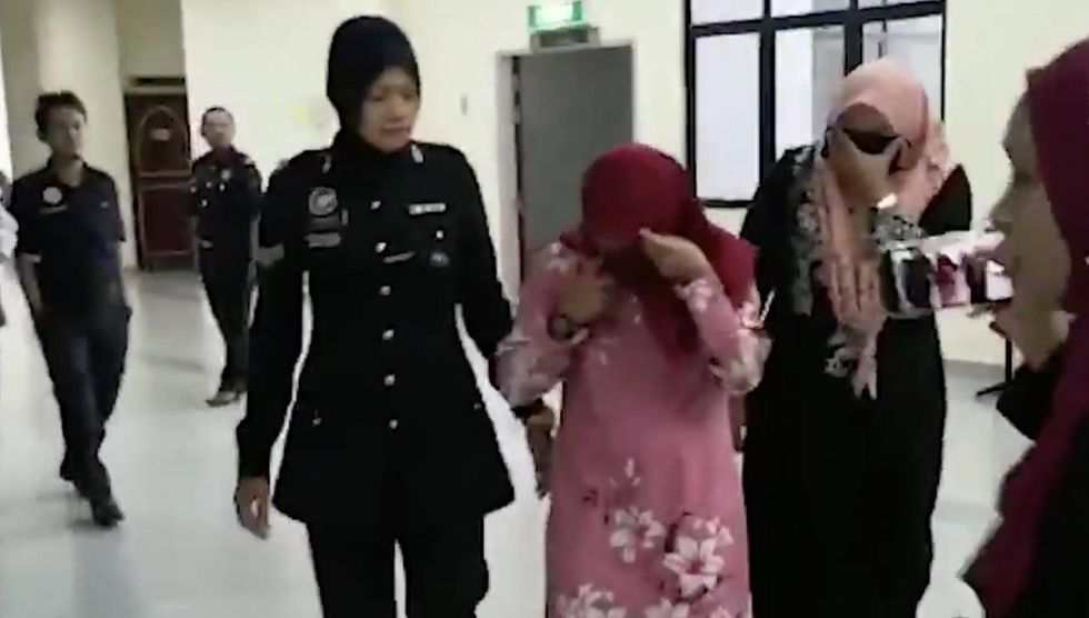 Two Malaysian women caned publicly after pleading guilty to attempting to have lesbian sex