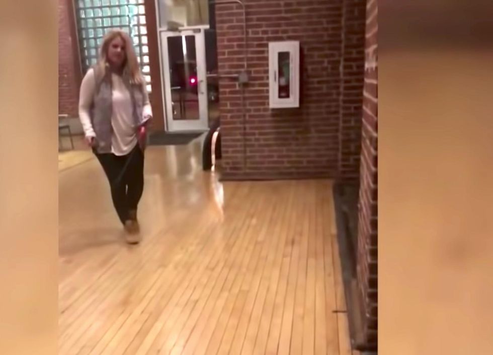 Woman blocks black man from entering apt. building in viral video - it does not end well