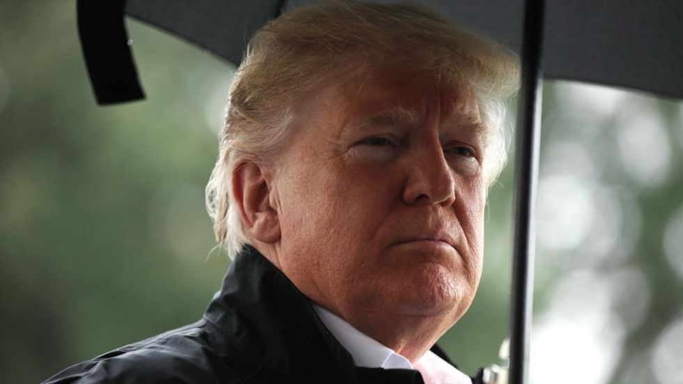 MIGRANT STAREDOWN: Who do you think will win — leftists or Trump?