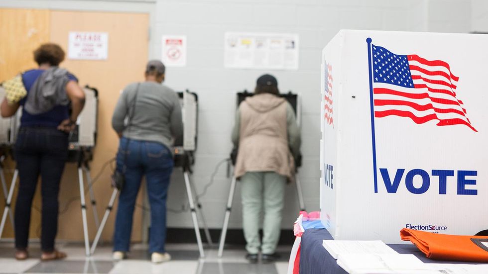 New campaign seeks to ban guns at polling places, asks people to report others with firearms