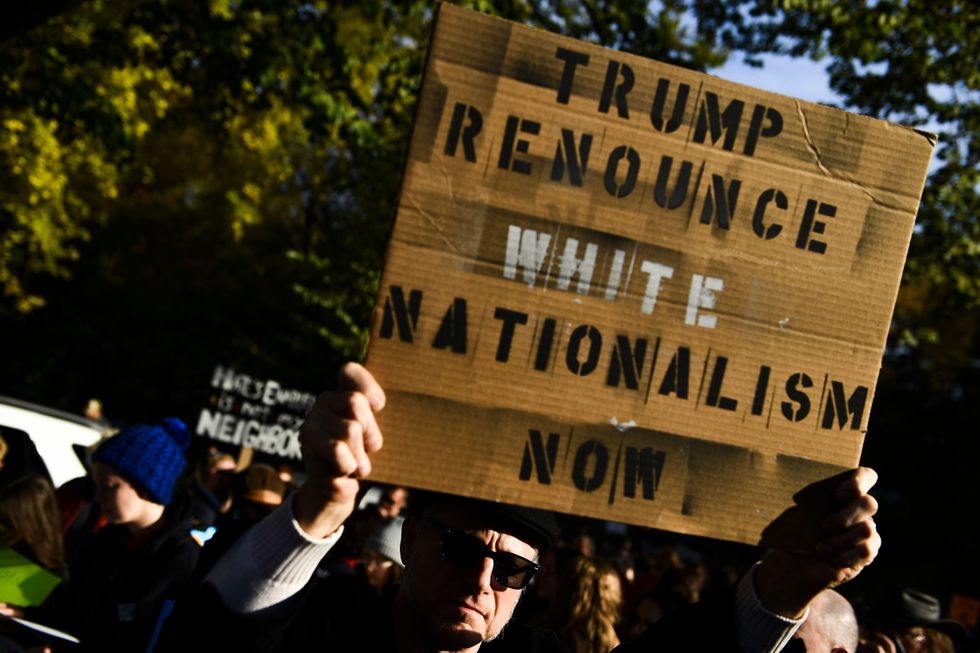 Rabbi whose congregants were murdered reportedly received hate mail for welcoming Trump to synagogue