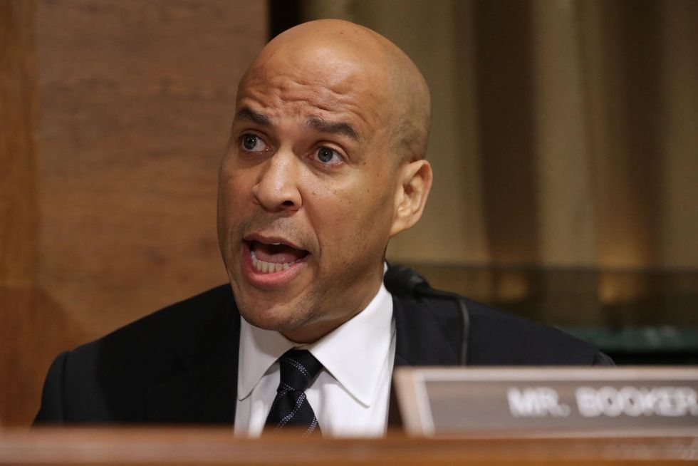 NJ governor signs law allowing Cory Booker to run for both the Senate and the presidency in 2020
