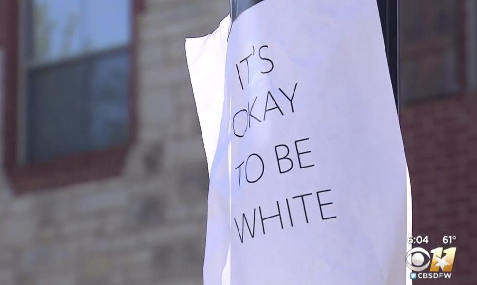 ‘It’s okay to be white’ signs emerge in Texas neighborhood. Identical posters pop up on campuses.