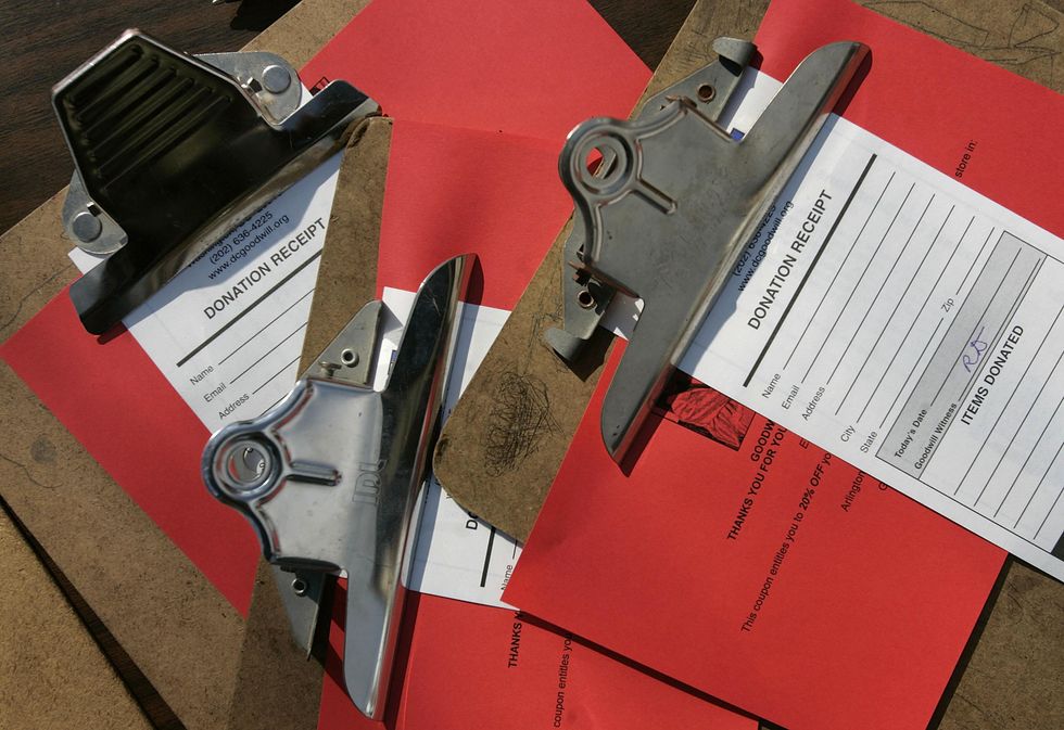 Goodwill worker sorts through clothing from a donation bin — and gets a nasty surprise