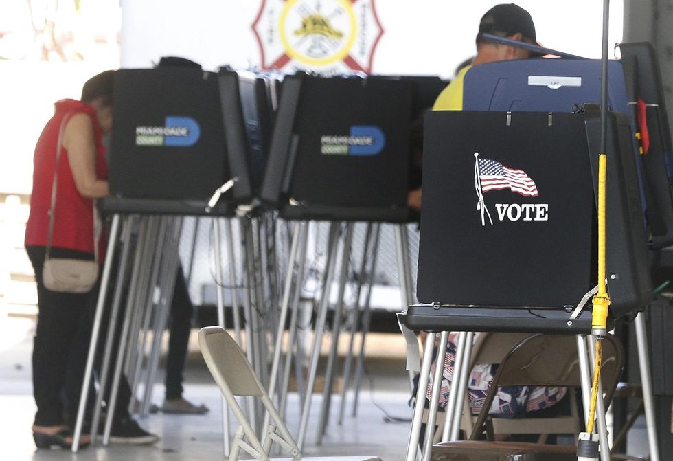 Florida approves ballot measure to restore voting rights to former felons