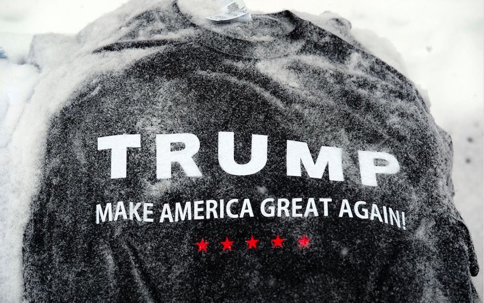 Voter allegedly denied entry into polling place over his Trump shirt. So he voted shirtless.