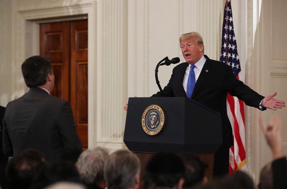 Trump scolds Jim Acosta as a 'rude, terrible person' during heated exchange at news conference