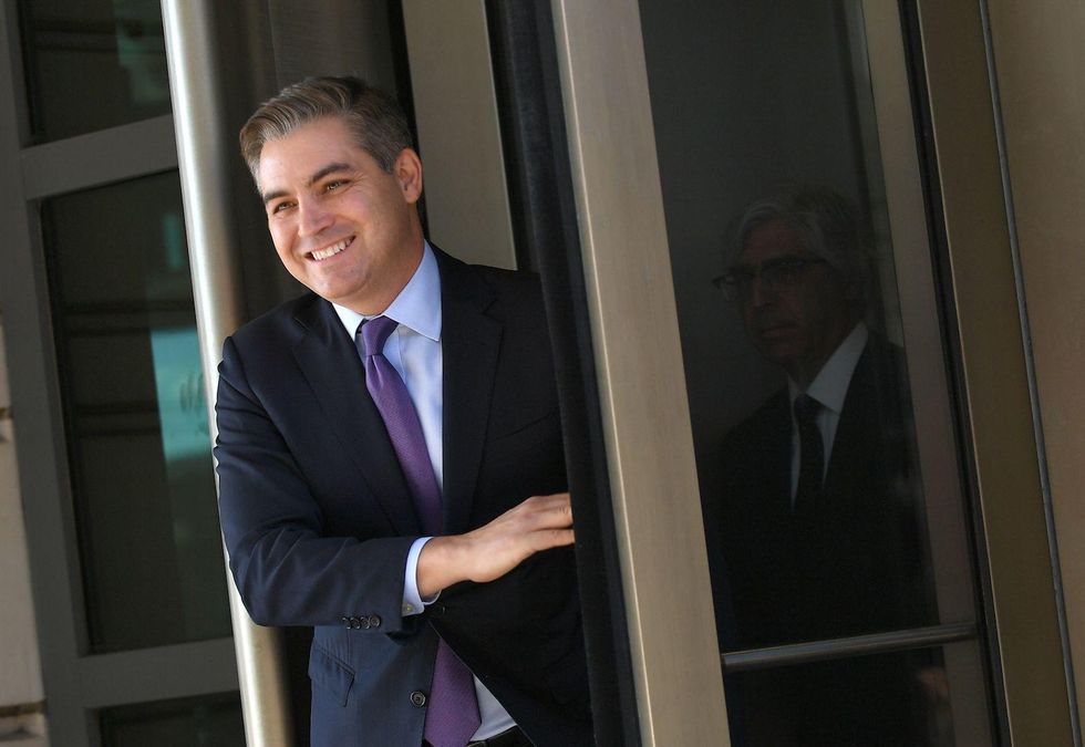 White House fully restores Acosta's press pass; CNN says it will end lawsuit