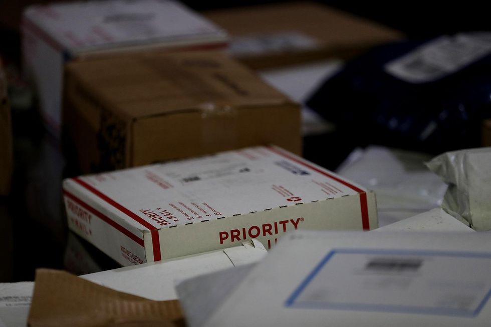 16 US postal workers headed to federal prison for taking bribes to deliver cocaine during routes