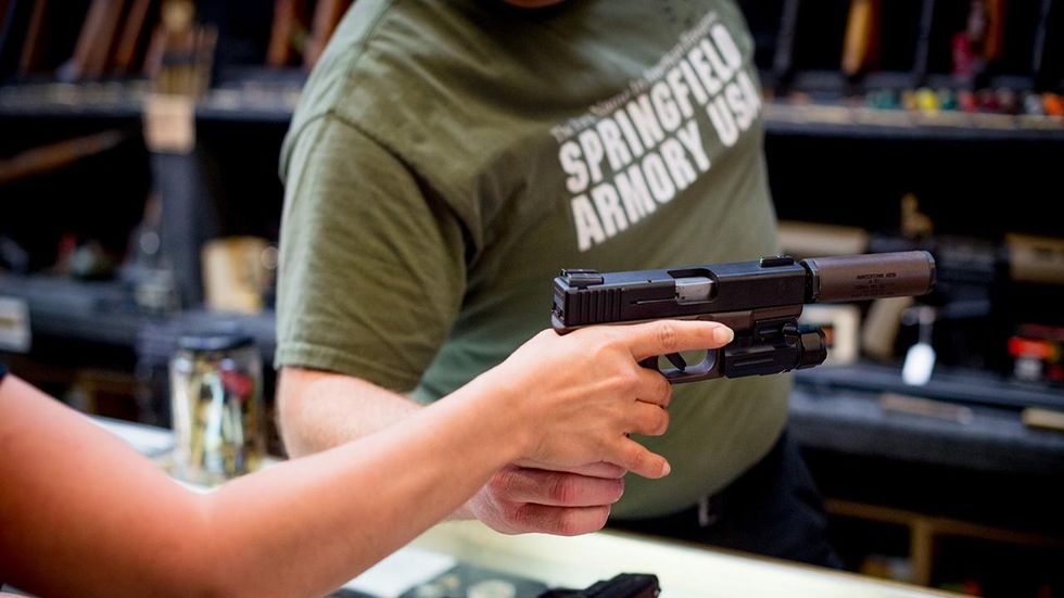 Landlord tells Harvard grad student she needs to move out because she has legally owned guns