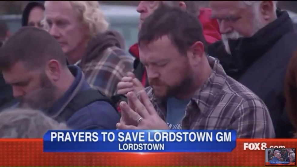 Over 100 GM workers gather for tearful, emotional prayer vigil after losing jobs ahead of Christmas