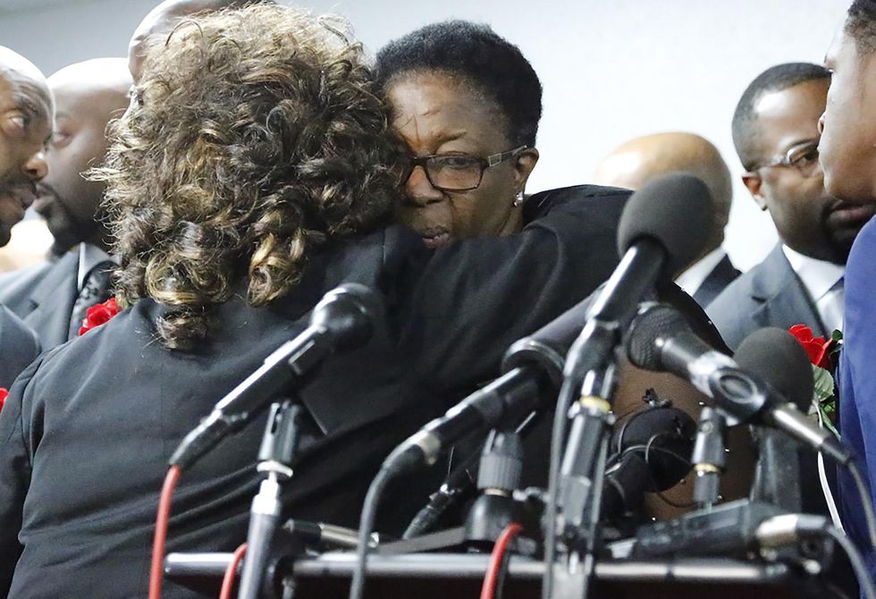 Police officer who shot unarmed black man in his own apartment to face murder charge