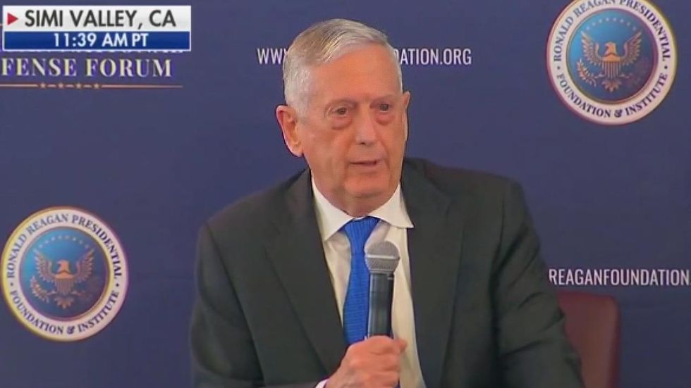 James Mattis blasts Putin as 'slow learner' and reveals Russia attempted to interfere with midterms