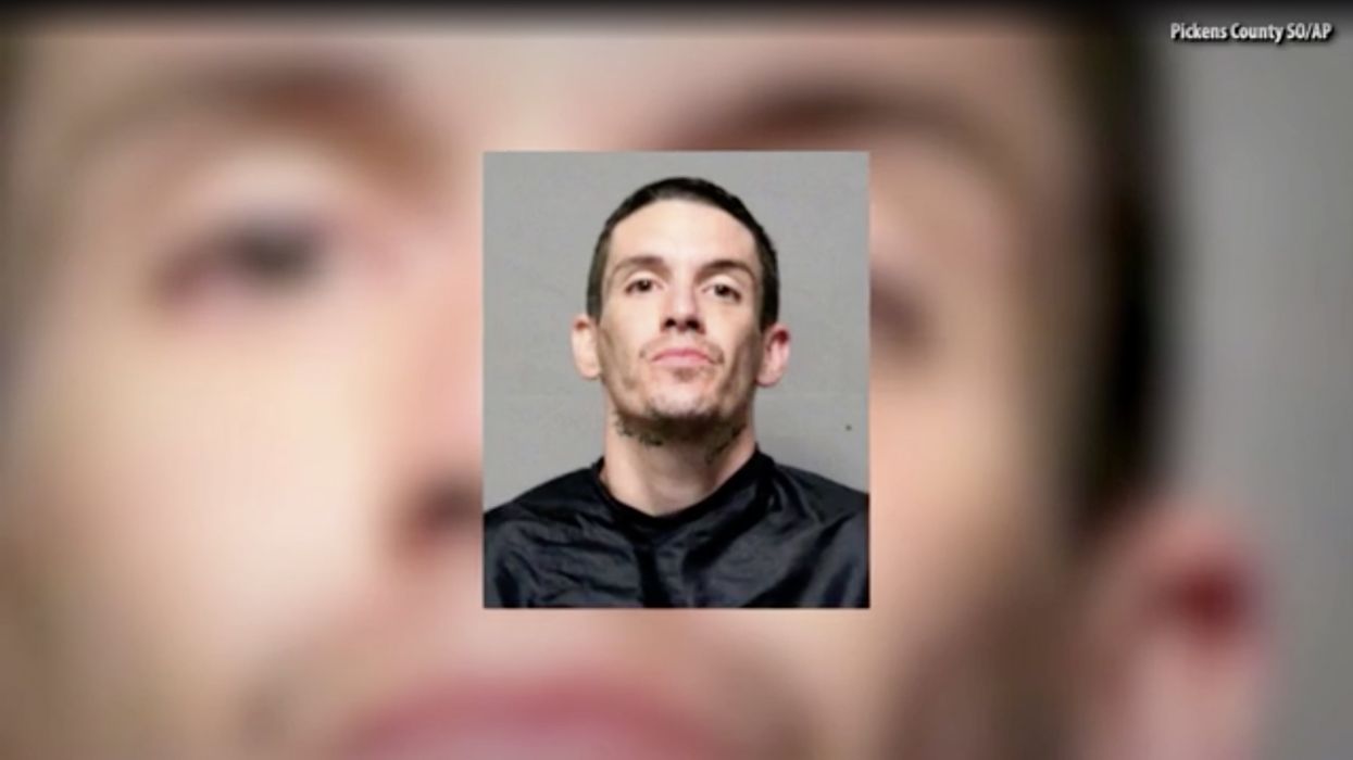 Inmate escapes from jail — but realizes he picks wrong door to kick in when he finds armed woman behind it