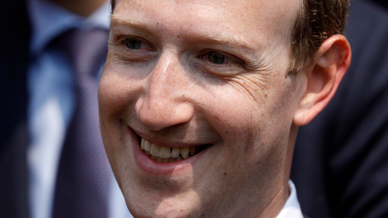 Facebook censors photo that ‘may show violent or graphic content.’ Photo depicts Santa Claus kneeling to honor baby Jesus in manger.