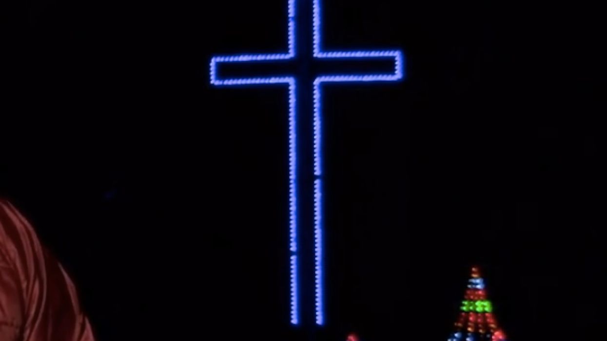Atheist group convinces city to remove lighted cross from park. Then residents make their voices heard.