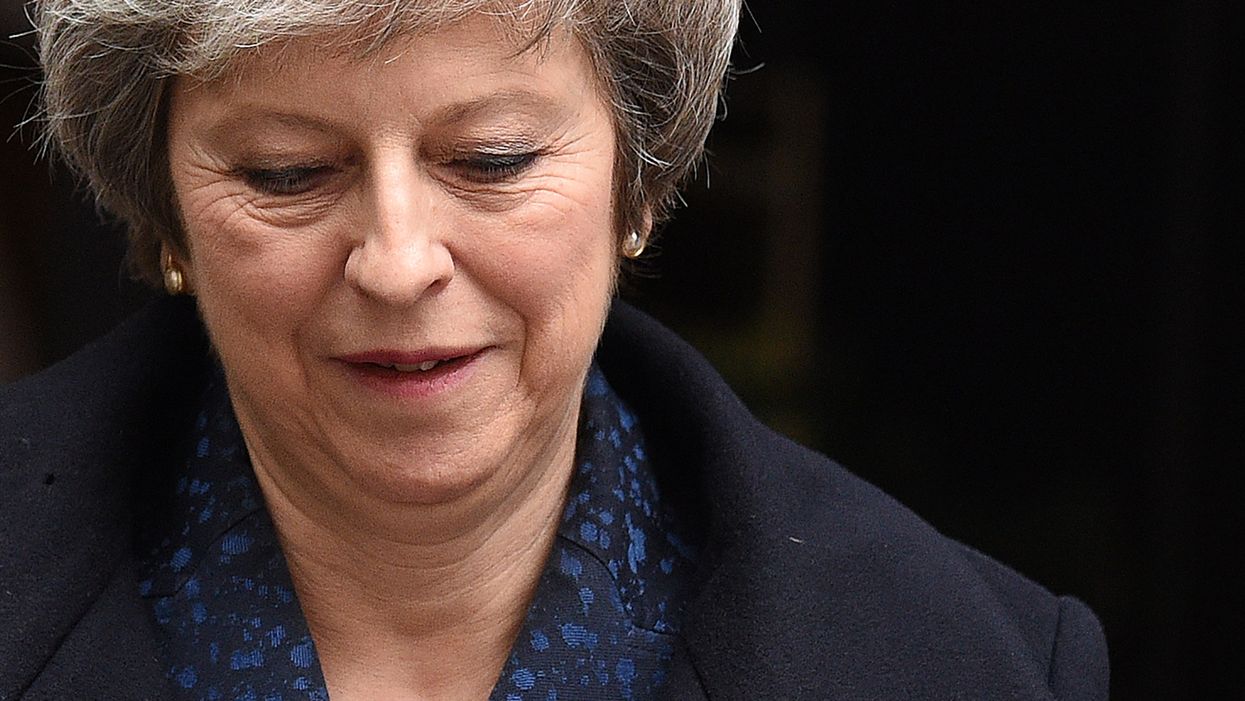 British Prime Minister Theresa May survives effort to vote her out of power