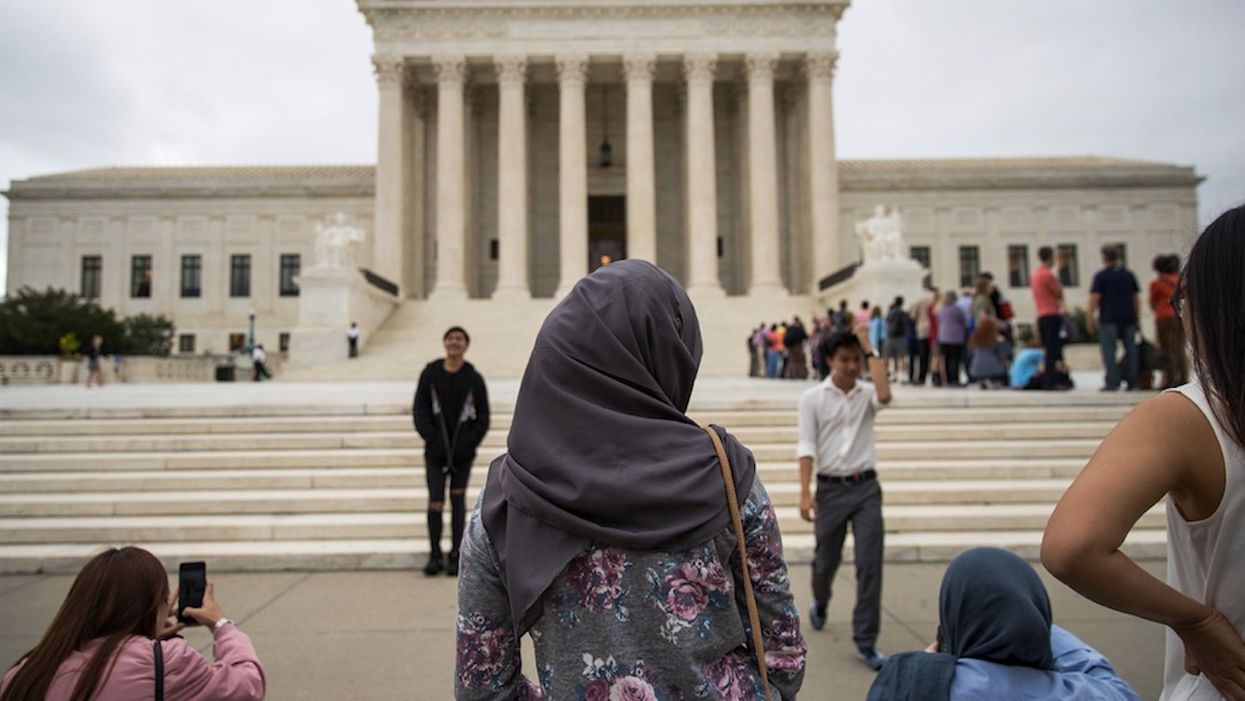 Student who converted to Islam says school expelled her for wearing hijab. But school tells different story.