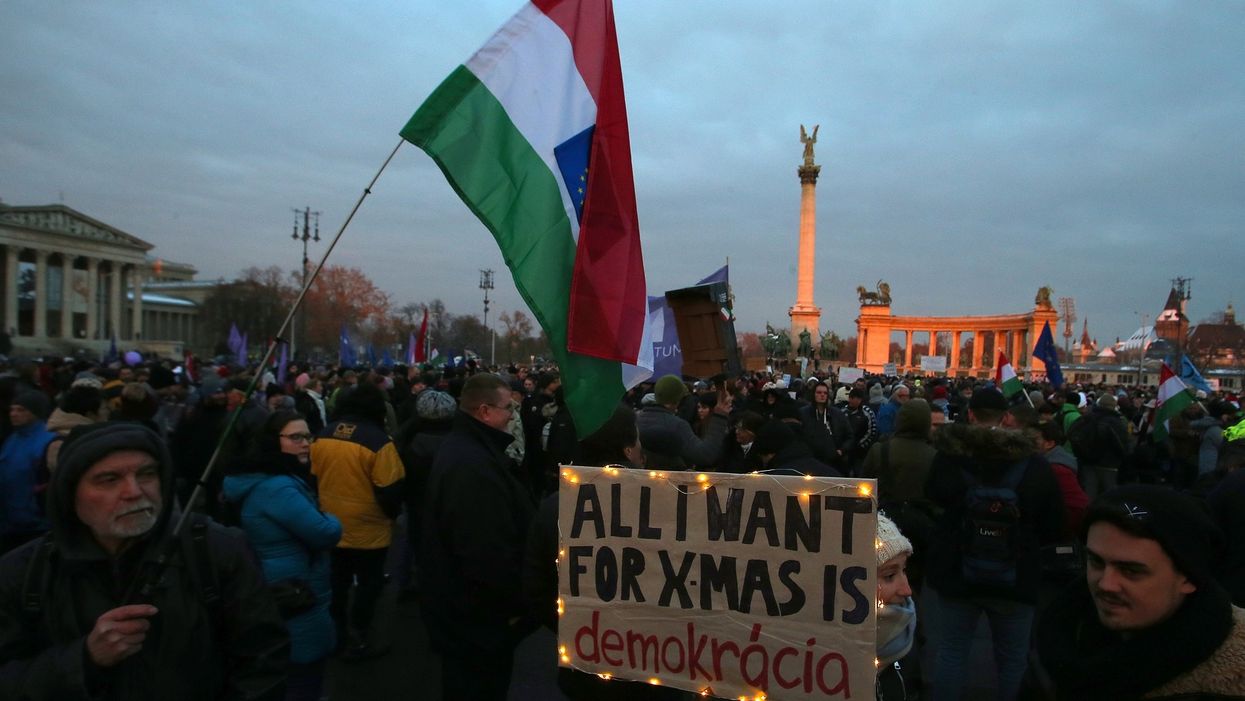 Hungarian workers protest new 'slave law' with smoke grenades during fourth day of demonstrations