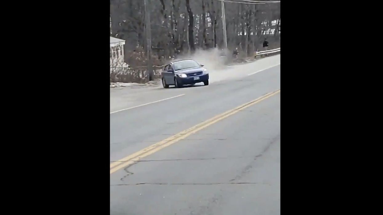 Terrifying video from inside truck shows speeding car crashing into it after driving over police spike strips