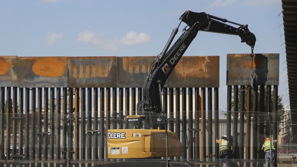 White House signals it will back down on demand that spending bill include funding for border wall