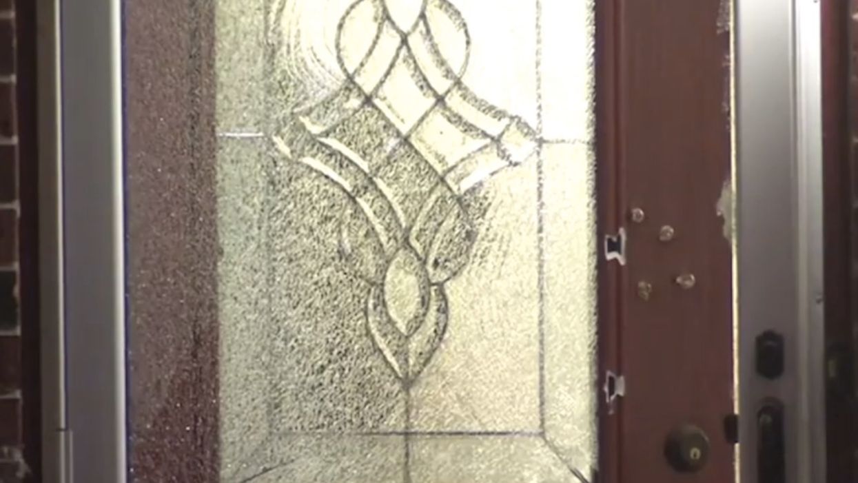 Homeowner shoots man three times at front door after smartphone app said someone was trying to enter