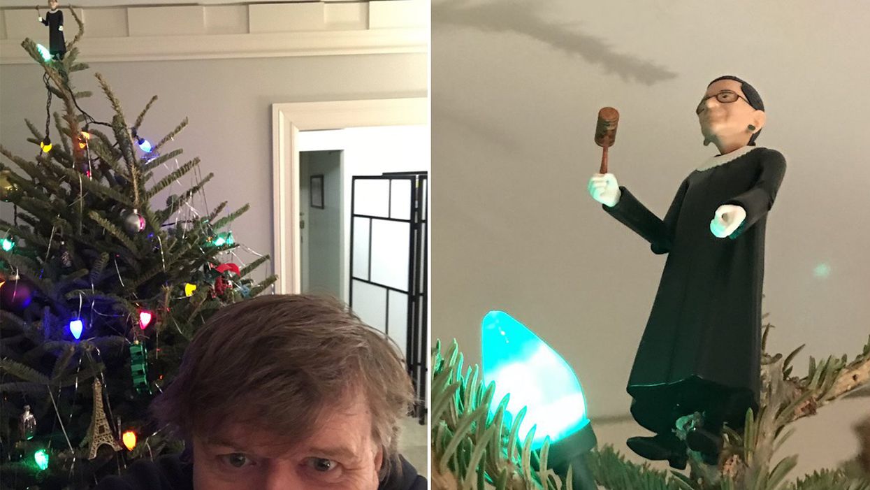 Michael Moore tops Christmas tree with Ruth Bader Ginsburg doll. Twitter's response is priceless.