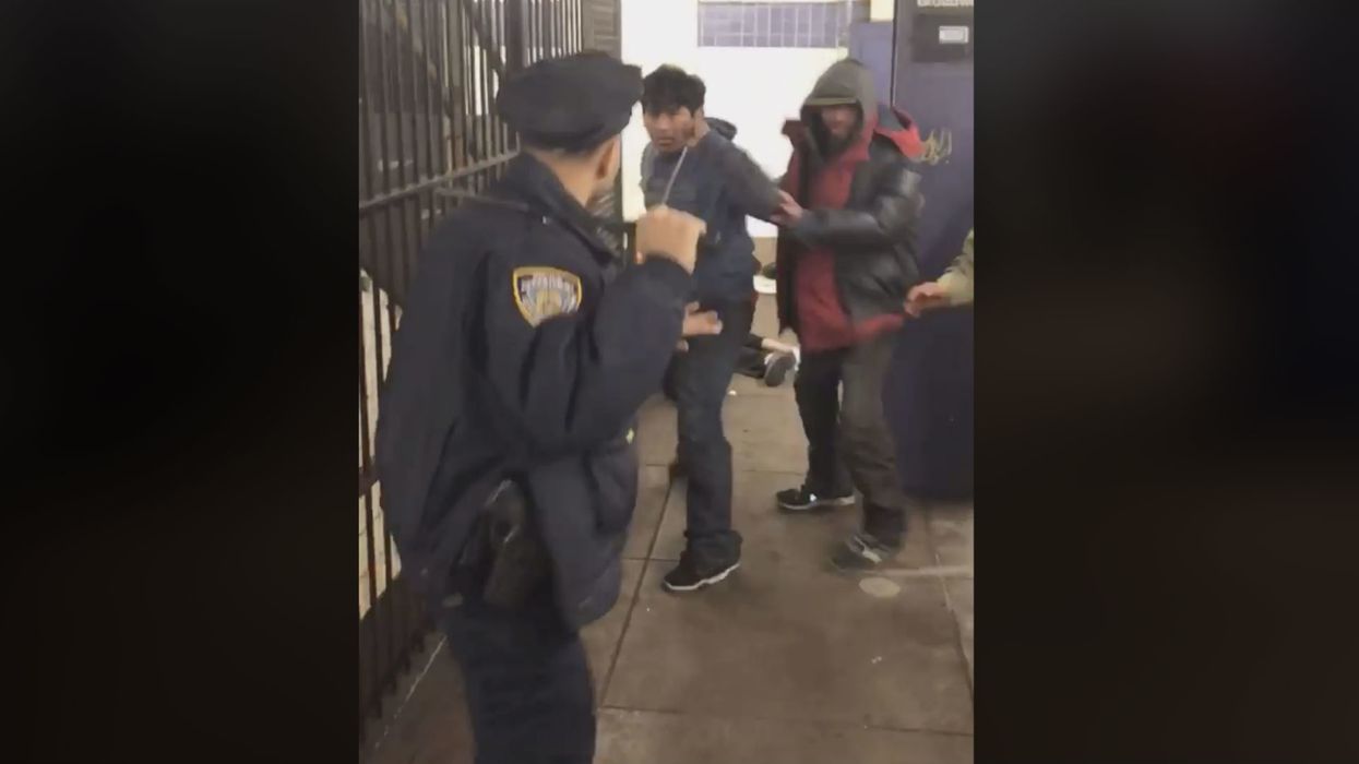 VIDEO: Lone NYPD cop praised for restraint while fending off group of homeless vagrants: 'I don't want to hurt you!'