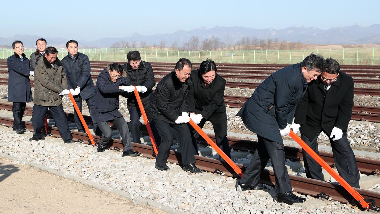 North, South Korea ceremoniously link railroads — but there won't be any trains running