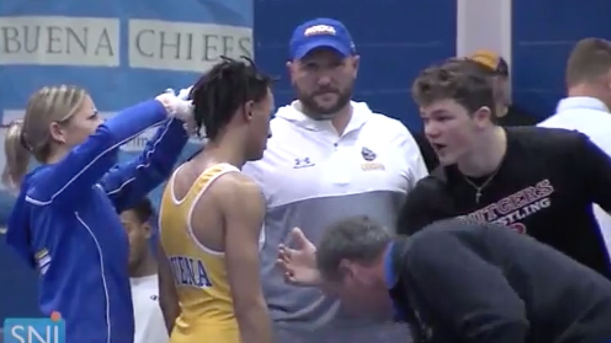 Referee forces  high school wrestler to cut dreadlocks or forfeit match, won't work in the district again