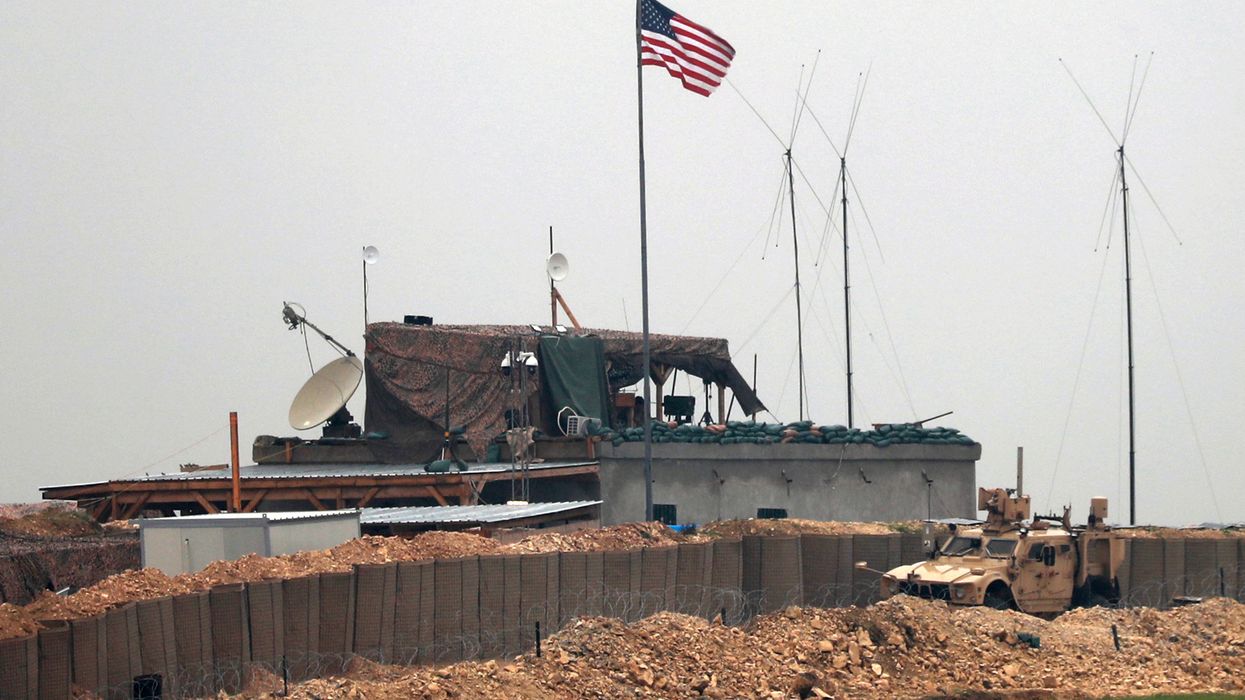 As US troops leave, Kurds invite Syrian forces to take over strategic city