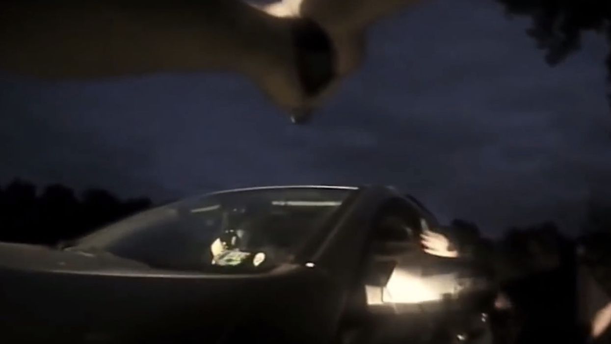Terrifying video: Accused killer aims at cop, pulls trigger — but gun doesn't fire. It's his final mishap.