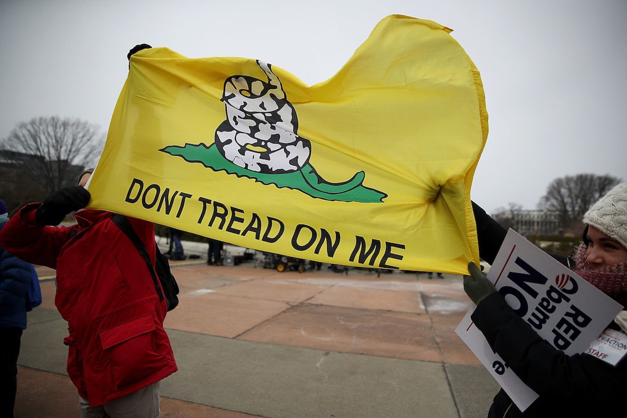 Woman calls cops on man playing with his kids at park because she was afraid of his pro-gun shirt