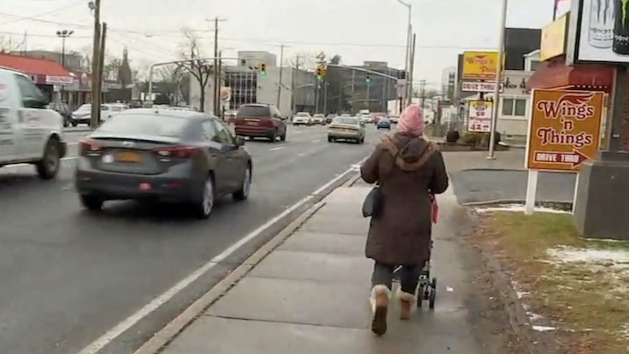 Man allegedly tries kidnapping 1-year-old from stroller right in front of Mom. But she's having none of it.