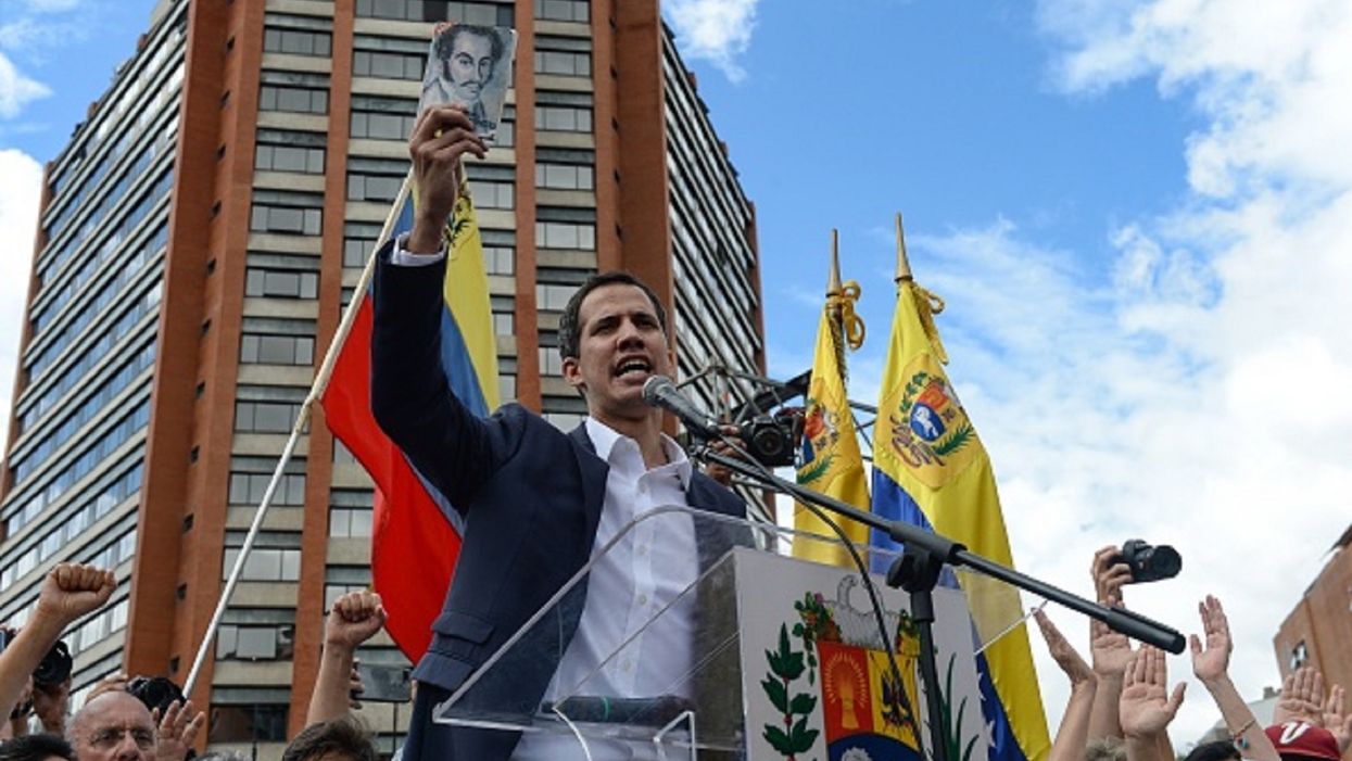 US-backed Venezuelan opposition leader swears himself in as president while protests against Maduro erupt