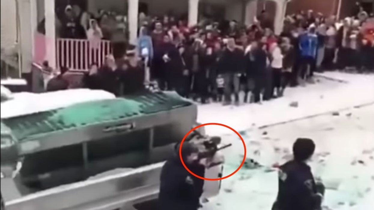 WATCH: University snow day descends into mass chaos after rowdy students clash with police