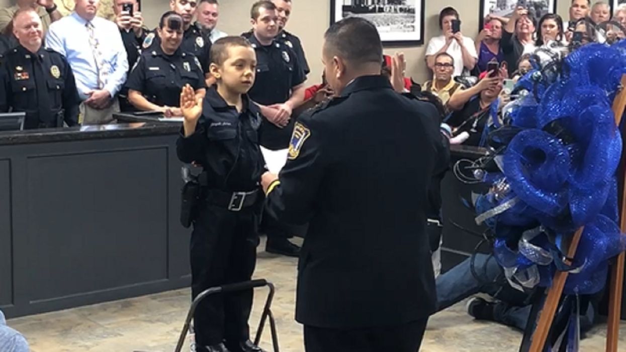 She's fighting the 'bad guys': 6-year-old cancer patient fulfills dream of being sworn in as Texas police officer