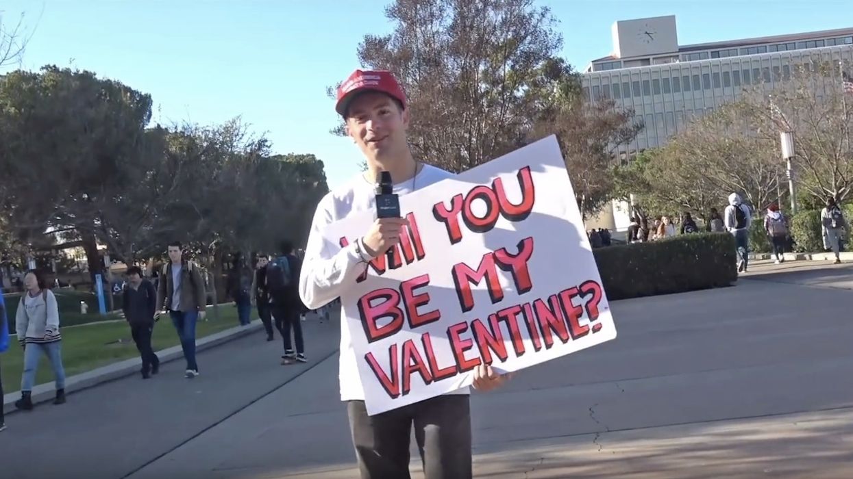 He wears MAGA hat, holds sign asking college women if they'll be his 'Valentine.' You already know their answers.