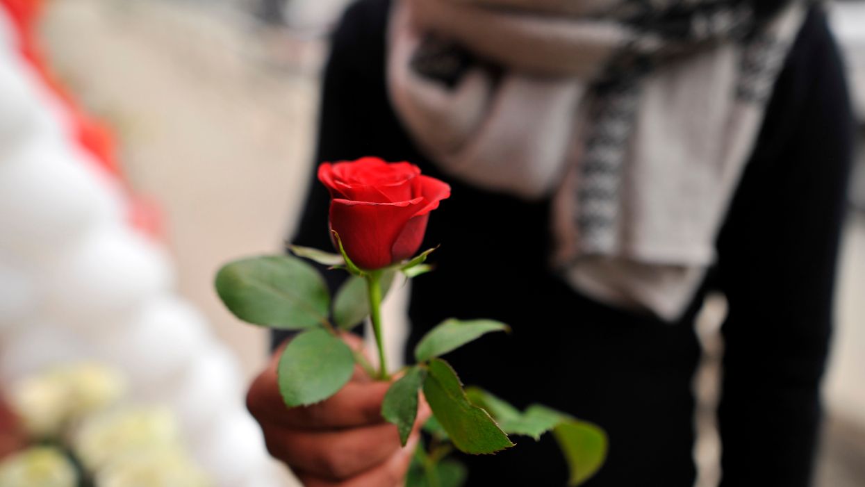 For eight years now, a group of men has been passing out roses to widows and military wives on Valentine's Day