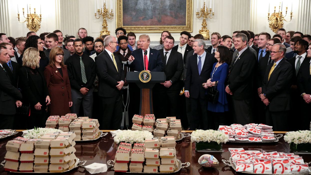 Trump ignores critics, serves fast food to more athletes. This time, it’s Chick-fil-A.