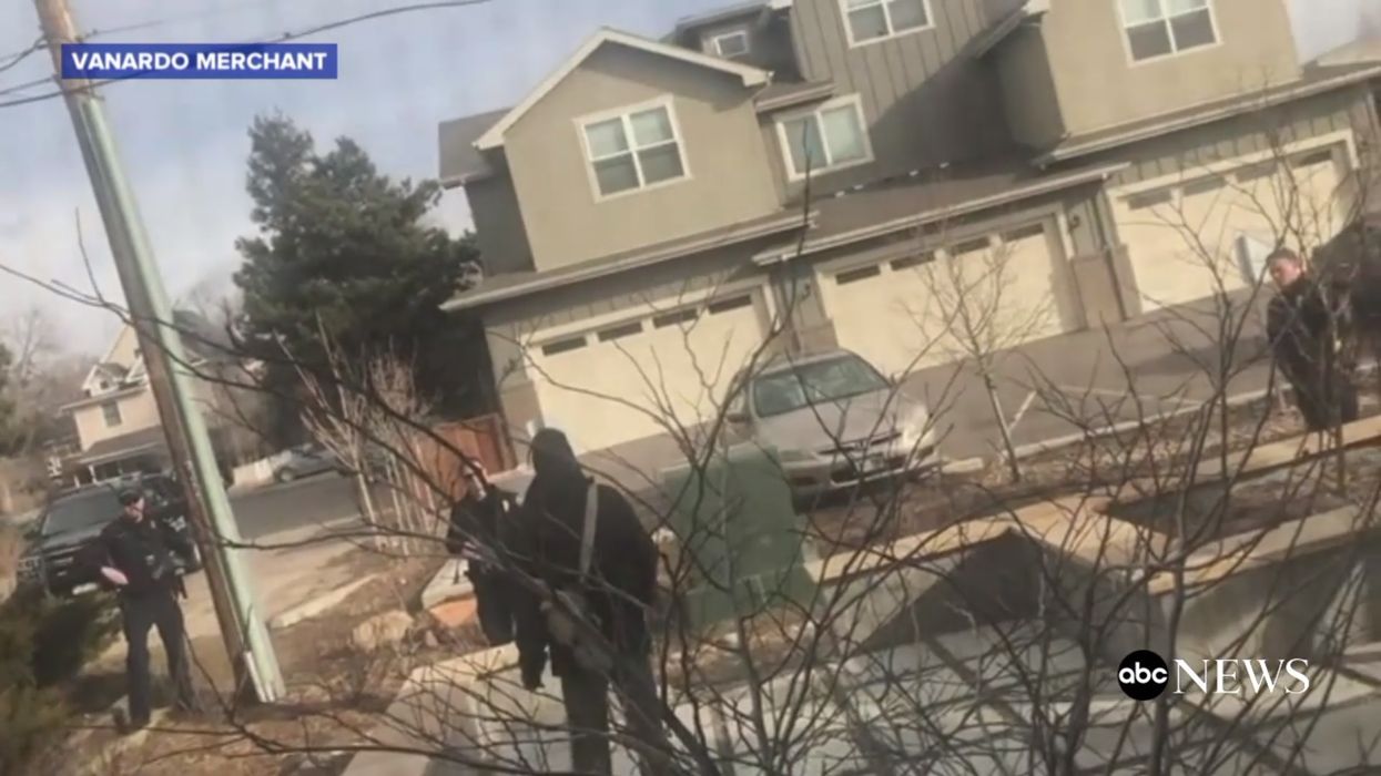 Watch: Police in Colorado draw gun in confrontation with unarmed black man who was picking up trash in his yard