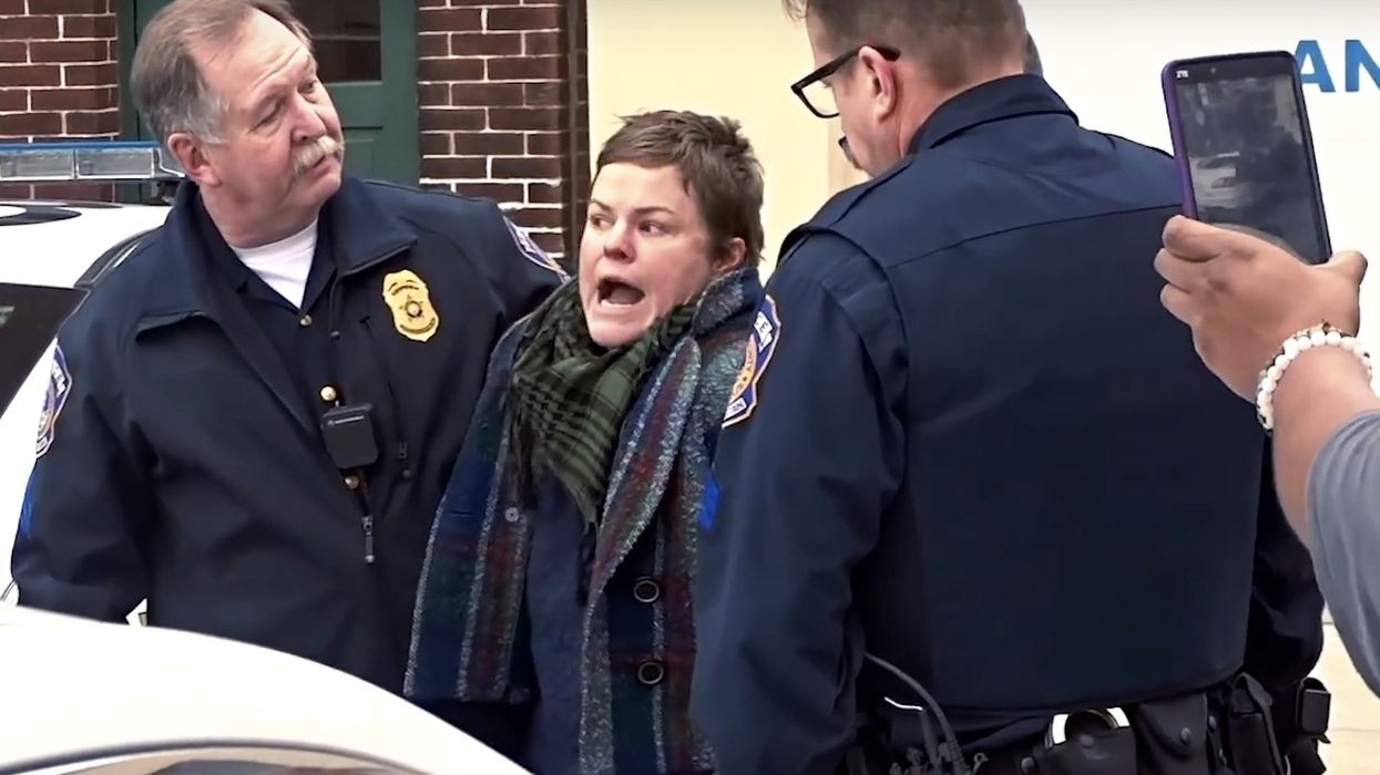 Woman allegedly tries taking Virgin Mary statue at Drag Queen Story Hour protest — then freaks out at intervening cops