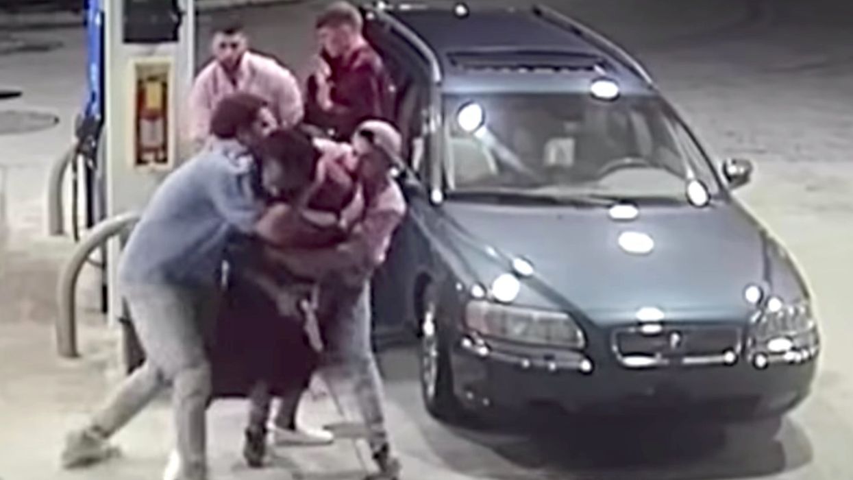 WATCH: Startling surveillance video shows what happens when four men turn the tables on an armed robber