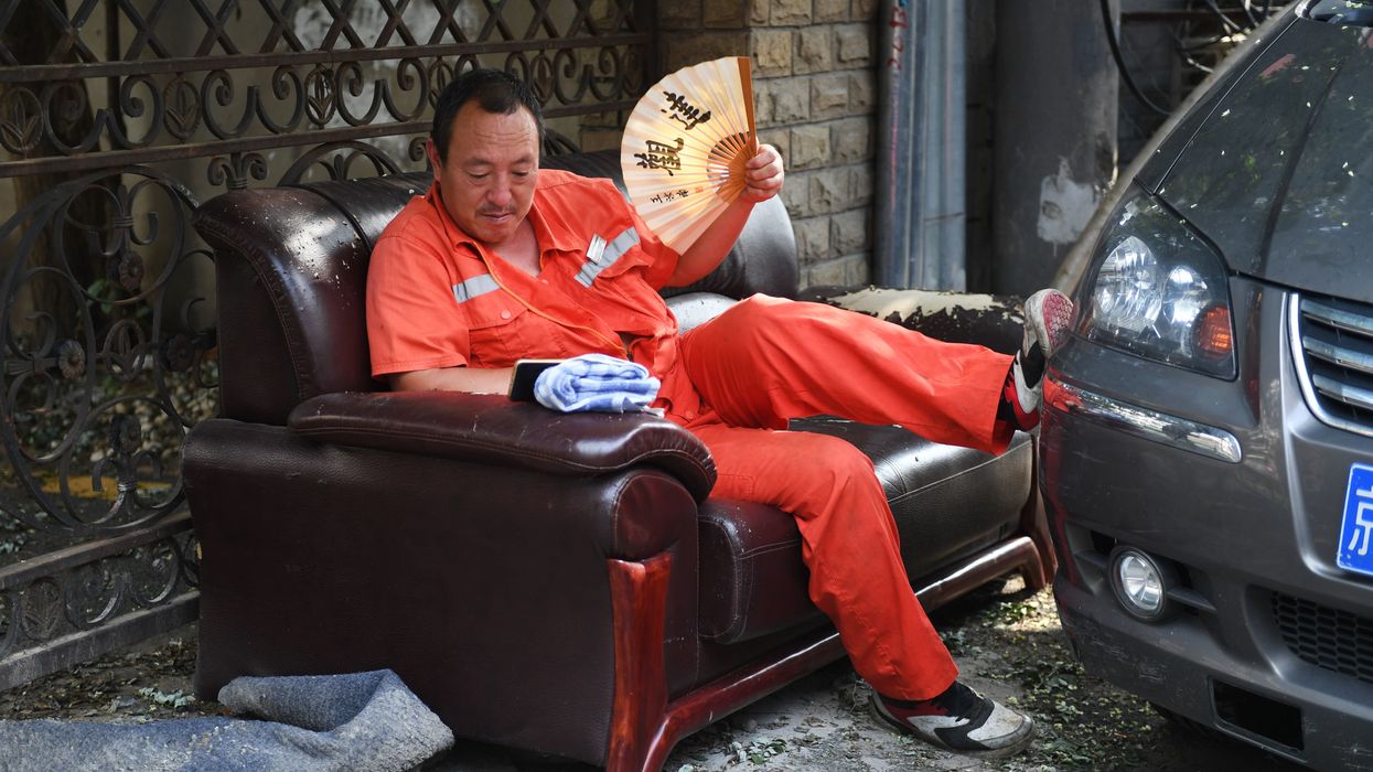 Street cleaners in China forced to wear GPS trackers to ensure they don't take too many breaks